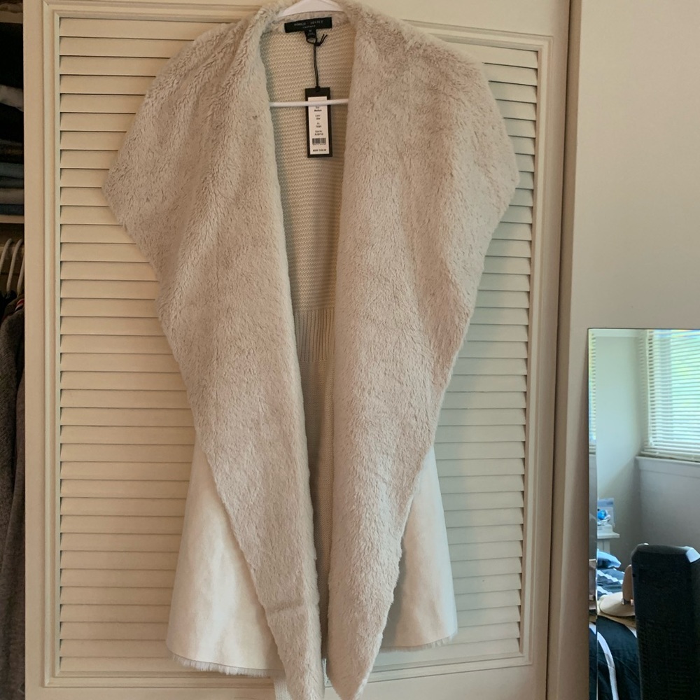 Beautiful cream color west with tags on!